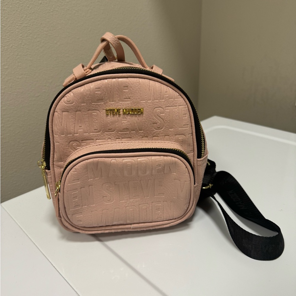Pink mini backpack w/tassle